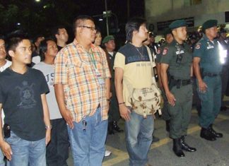 Police and volunteers prepare to head out to Walking Street to make sure all entertainment venues adhere to the new agreement.